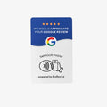 Hand tapping a matte white and blue Google Review Card against a phone to trigger an instant review in Sydney CBD networking.